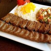 Kabob Soltani · Served with a choice of salad or basmati rice with saffron. Beef kabob with extra koobideh.
