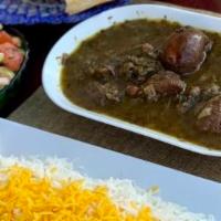 Ghormeh Sabzi Stew · Served with a slice of freshly baked bread and basmati rice. Chopped parsley, coriander, and...