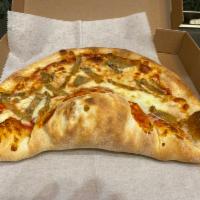 53. Half Moon Calzone · Our special combination of 2 classics: 1/2 calzone and the other 1/2 is pizza, fun to eat. 