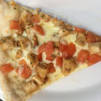 Chicken Tomato Pizza Slice · Savory pie with a dough base topped with sauce and cheese.