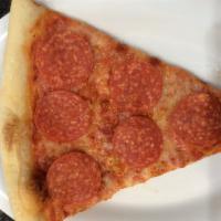Pepperoni Pizza Slice · Savory pie with a dough base topped with sauce and cheese.