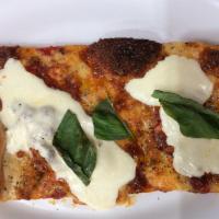 Grandpa Sicilian Pizza Slice · Savory pie with a dough base topped with sauce and cheese.
