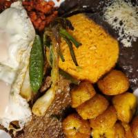 Bandeja Campesina · Steak with two eggs, Mexican sausage and sweet plantains.