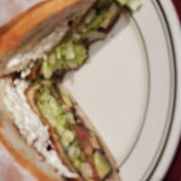 Torta Cubana · Cuban sandwich. Served with beans, lettuce, tomatoes, jalapenos, avocado and mayonnaise.ques...