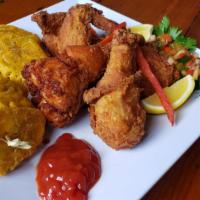 Pica-Pollo (Fried Chicken) · 1/2 a chicken, lime cured and seasoned.  Then Fried to its juicy and crispy balance