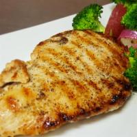 Grilled Chicken Breast (Pechuga Parrilla) · Grilled chicken breast slowly cooked to its juicy perfection. Served with your choice of sid...