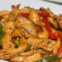 Chicken Teriyaki · Sauteed chicken strips with onions, red peppers and green peppers in a delicious teriyaki sa...