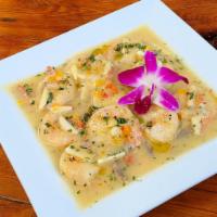 Garlic Shrimp (Camarones al Ajillo) · Lime cured shrimps in our famous garlic sauce, cilantro and parsley white wine sauce. Served...