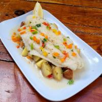 Fish Fillet (Swai) (Filete de Pescado) · A fresh water Swai Fish Filet, lime cured and fried to its crispy perfection.