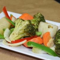 Steamed Vegetables (Vegetales Salteados) · Carrots, red and green peppers, potatoes and onions in garlic butter