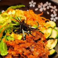 Spicy Pork Bibimbap 제육 비빔밥 · Served with seasoned rice, fresh greens, seasonal veggies, and gochujang chili paste