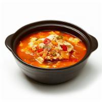 Korean Spicy Soft tofu stew with beef · Soft tofu, beef, zucchini, homemade kimchi, Korean chili, egg