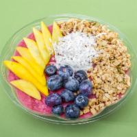 3. Pitaya Bowl  · Pitaya pulp, mangoes, pineapples, strawberries, almond milk. Topped with granola, bananas, s...