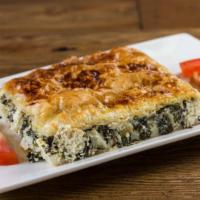 Spanakopita Appetizer · Phyllo pastry stuffed with spinach and feta cheese.