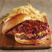 Hickory BBQ Burger · freshly ground 10oz burger, bacon, topped
with melted cheddar, red onion & hickory bbq sauce...