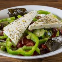 Traditional Greek Salad (32oz.) · Tomatoes, cucumbers, green bell peppers, onions, feta cheese, Kalamata olives, dried oregano...