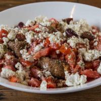 Dakos Salad (32oz.) · Barley rusks topped with chopped tomatoes, crumbled feta cheese, olives and oregano. Drizzle...