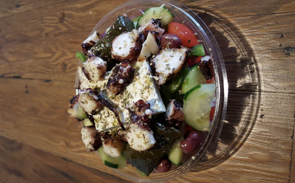 Octopus Salad · Char-Grilled Octopus over Romaine lettuce, tomatoes, onions, cucumbers, Kalamata olives and feta cheese.