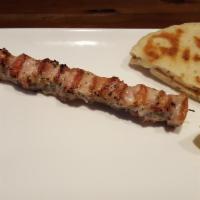 Chicken Stick · Marinated and char-grilled chicken on a stick.