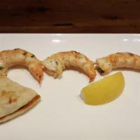 Shrimp Stick · Marinated and char-grilled jumbo shrimp.