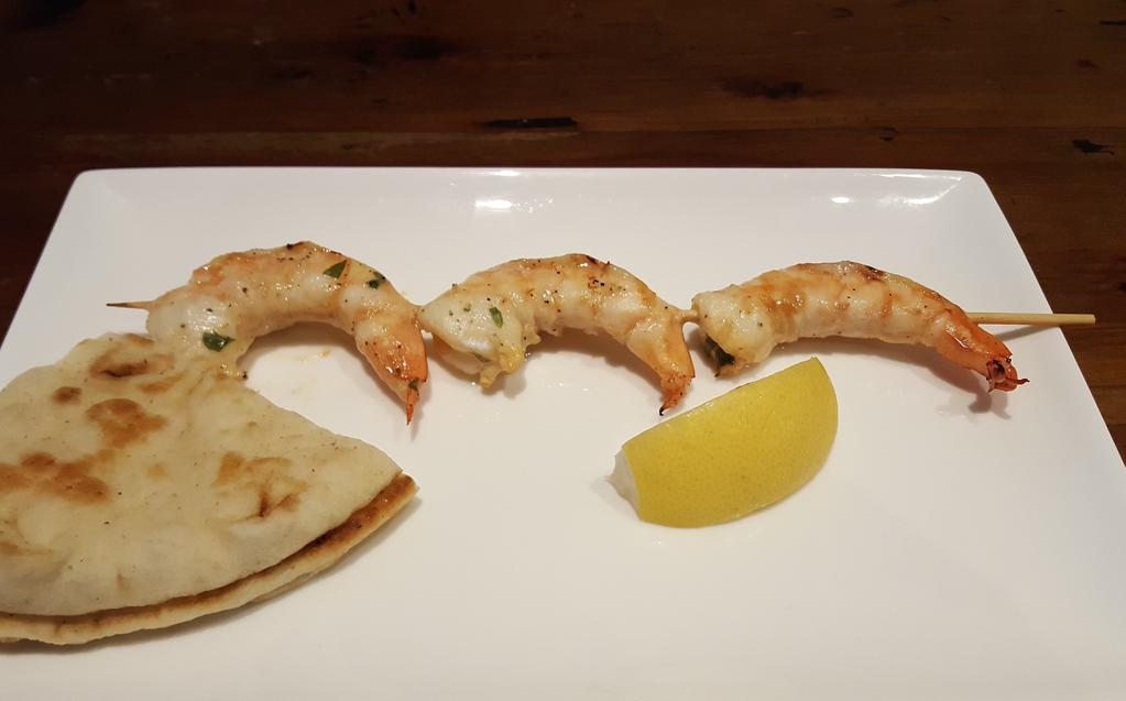 Shrimp Stick · Marinated and char-grilled jumbo shrimp.