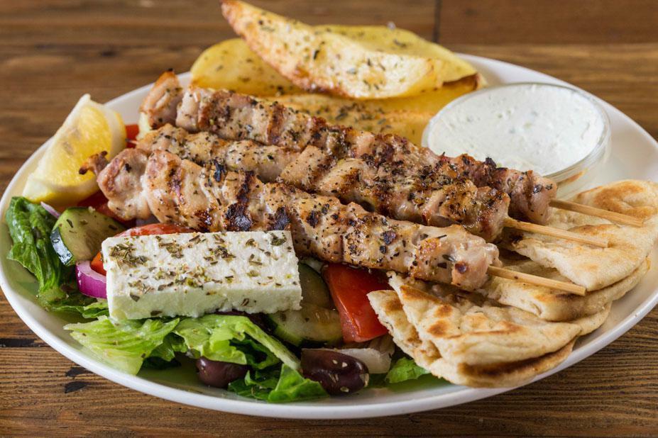 Chicken Sticks Platter · 3 sticks of marinated and char-grilled chicken cubes. Served with Greek salad, warm pita bread, choice of sauce and choice of side.