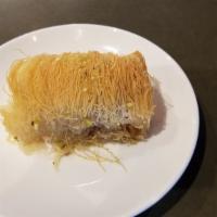Kataifi · Mouth-Watering Greek desert made from shredded phyllo dough and filled with walnuts drenched...