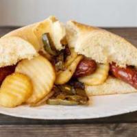 13- Italian Hot Dog (pizza bread, 2 dogs, peppers/onions, potatoes) · 2 Fried Hot Dogs served in pizza bread with peppers, onions and potatoes