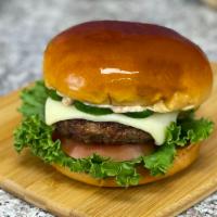 It’s LIT Burger + Fries · Prime rib steak patty, American cheese, lettuce, tomato, jalapeños, signature LIT sauce on a...