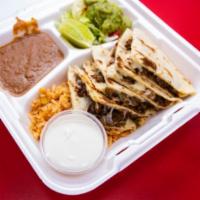 Quesadilla Plate Lunch Special · Your choice of meat shredded mozzarella cheese melted between handmade tortillas. Served wit...