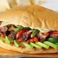 Tequila Lime Carne Asada Torta · Savory and juicy carne asada is loaded onto a soft roll of your choice and piled high with a...