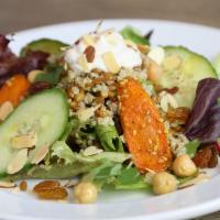 Roasted Carrot Tahini Salad Grain Bowl · Honey & curry roasted carrots, mixed greens, chickpeas, cucumbers, golden raisins and sliced...