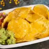 Los Cheesy Nachos · Warm nachos topped with melted cheese