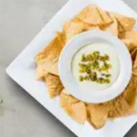 Chips ＆ Queso Love Story · Plain chips with queso dip on the side