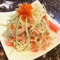 Kani Salad · Crab meat, cucumber, mayonnaise, tobiko and sesame seeds.