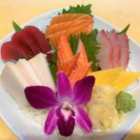 Chirashi · 15 pieces. Assorted sashimi over rice.