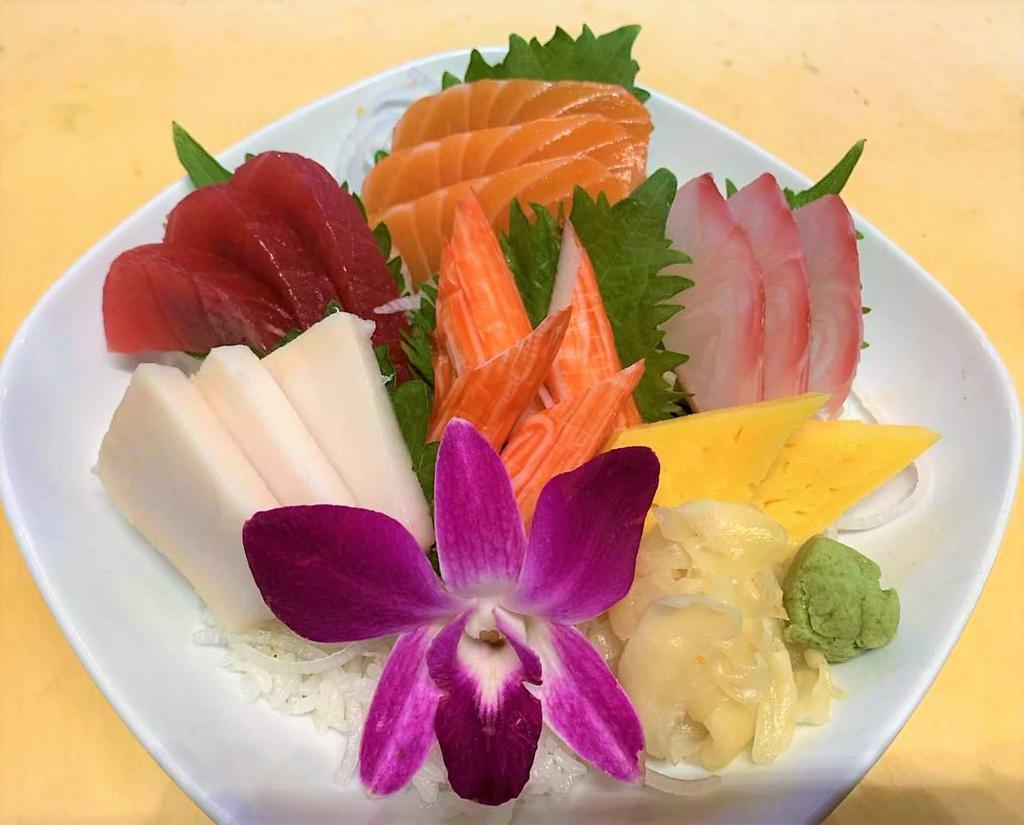 Chirashi · 15 pieces. Assorted sashimi over rice.