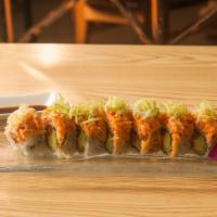 Alaska Special Roll · 8 pieces. Salmon, avocado, cucumber inside with spicy kani and lettuce on the top.