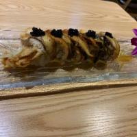 Black Widow Roll · 5 pieces. Fried soft shell crab, cucumber, mayo, lettuce, avocado, tobiko inside and eel wit...