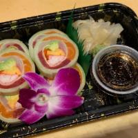 Cucumber Special Roll · 6 pieces. Tuna, salmon, white fish, tamago, avocado, каni and tobiko wrapped with cucumber a...