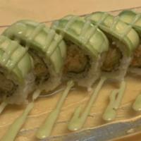 Fantastic Roll · 8 pieces. Salmon tempura, spicy каni inside, topped with avocado and wasabi sauce.