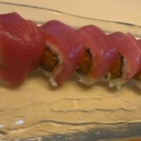 Golden Tuna Roll · 8 pieces. Spicy salmon, crunch, caviar, top with tuna.