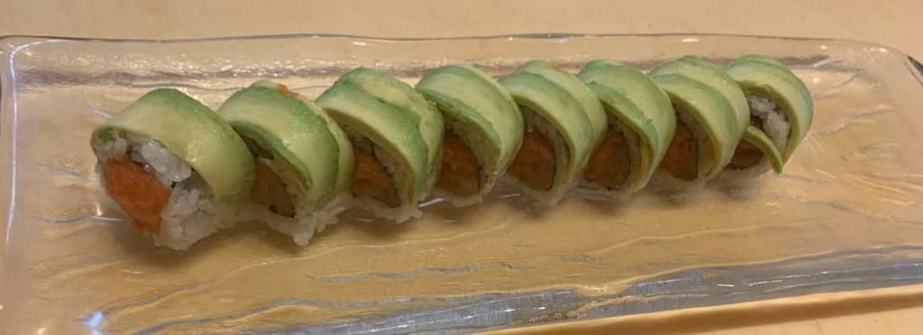 Moscow Roll · 8 pieces. Spicy tuna, flake, smoked salmon inside with avocado and sweet sauce on the top.
