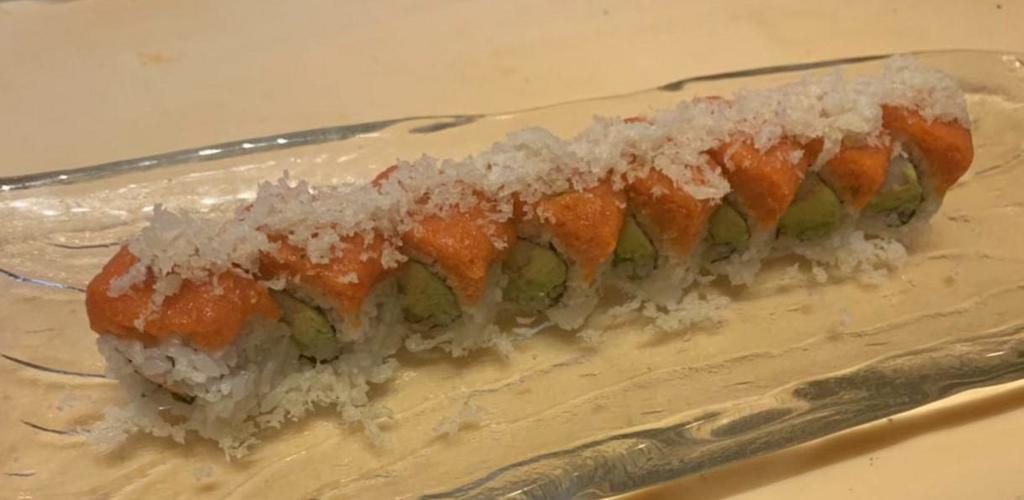 New York Roll · 8 pieces. Kani, cucumber, avocado inside with spicy tuna and tempura flake on the top.
