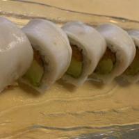 Snow White Roll · 8 pieces. Spicy scallop, avocado, crunch, tobiko, topped with white tuna and wasabi mayo.
