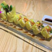 Yellowstone Roll · 8 pieces. Yellow soya paper wrap with eel tempura, avocado, mixed green and spicy tuna, top ...