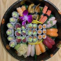 Party Platter A · 16 pieces sushi and 3 rolls. 2 pieces each: tuna, salmon, shrimp, yellowtail, eel, white fis...