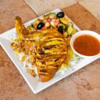 Chicken kabsa · Homemade Marinated Chicken served with Rice & Salad and our special homemade kansas sauce