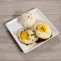 Loco Moco · 1/3 lb. black Angus patties, 2 eggs sunny side up, brown gravy and sticky rice.