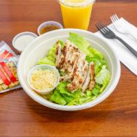 6. Grilled Chicken Caesar Salad  · Romaine lettuce, Parmesan cheese, croutons and Caesar dressing.